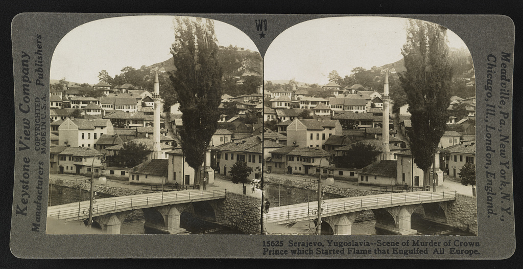 A Sarajevo stereograph showing a city street; its 1923 publisher caption connects the city with the assassination that preceded World War I, but the photograph does not depict the assassination itself.