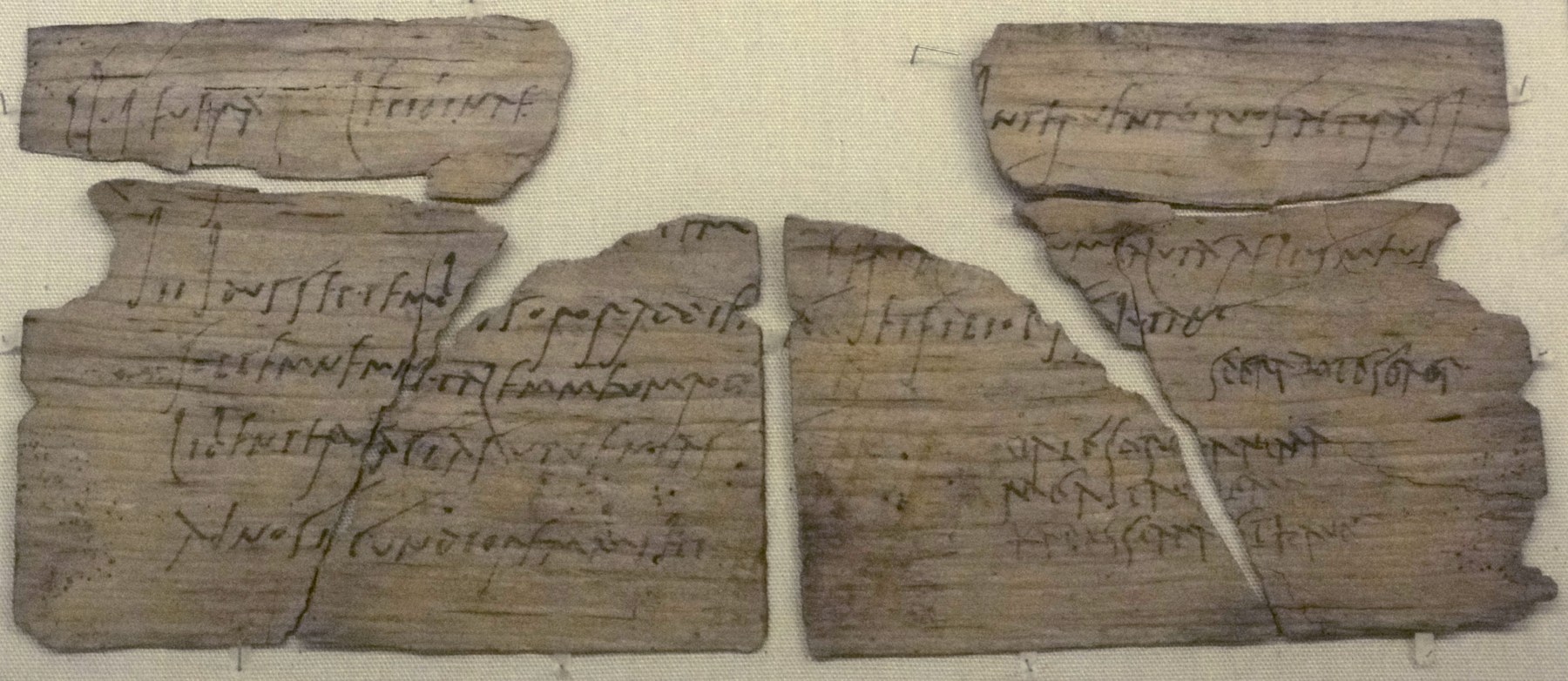Fragmented wooden leaves of Vindolanda tablet 291, bearing Claudia Severa's ink-written birthday invitation to Sulpicia Lepidina.