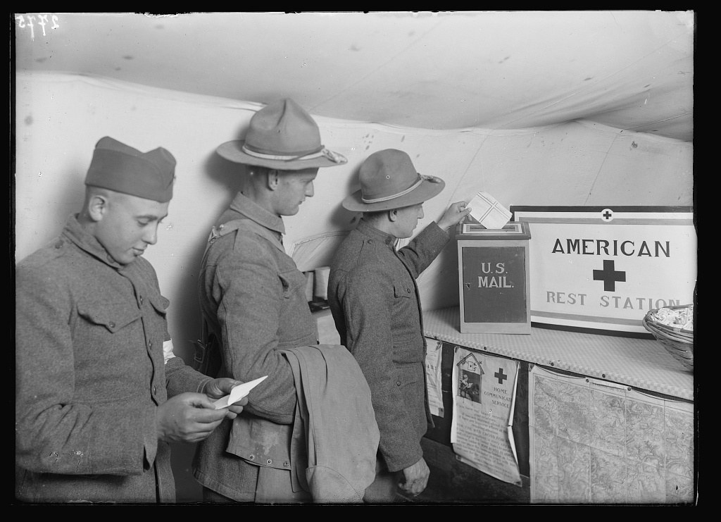 Context photograph: soldiers write letters home at an American Red Cross rest station in Toul, France, in 1918; this is not William James Bean or his letter.
